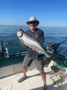 Angler with big fish in Olcott