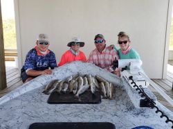 Four people fishing in Port O'Connor