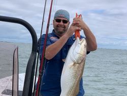 Lone angler with fishing rod in Texas