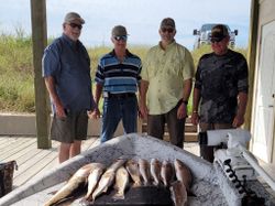 4 people fishing at Port O'Connor