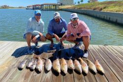 A group of 3 people fishing in Port O'Connor