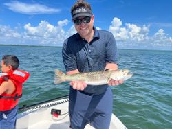 Two people fishing in the waters of Cape Coral