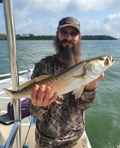 Fisherman angling in Florida with a single fish