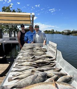 Three people enjoying a fishing adventure in LA