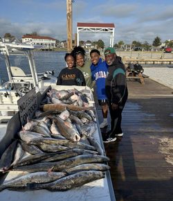 Four friends enjoying a fishing trip in Slidell