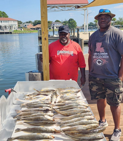 Two people fishing in Slidell