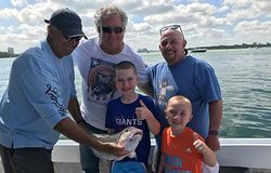 Group of 5 people enjoying a fishing trip in Miami Beach