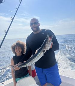 Two people fishing for Wahoo fish at Miami Beach