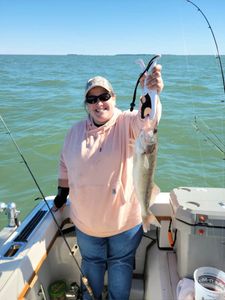 Person enjoying cruises, fishing, and tours in Port Clinton