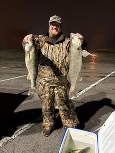 A person fishing in Port Clinton