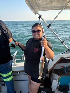 A person enjoys a fishing tour in Port Clinton