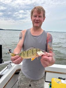 A person enjoying a fishing tour in Port Clinton