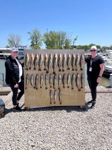 Two people enjoying cruises, fishing, and tours in Ohio