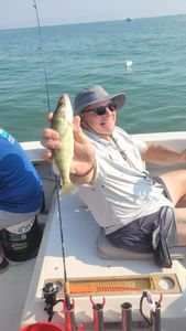 A person enjoying a cruise, fishing, or tour in Port Clinton