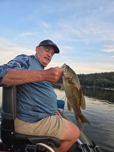 Angler holding a 19-inch freshwater fish in Leesburg