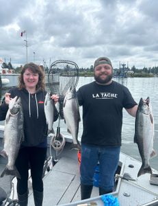 Three pink salmon and chinook salmon in a fishing scene in Oregon