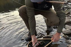 Fishing net being prepared in water at Newport PA