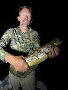Angler enjoying fishing trip in MI