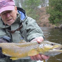 A fisherman holding a 17-inch catch in Baldwin