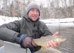 A person fishing in the Michigan outdoors