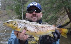 Photograph of a sea trout, a 20-inch fish caught while fishing in MI.