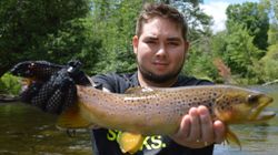 Photograph of a 20-inch sea trout caught while fishing in MI