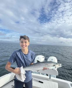 Photograph of a person fishing for a king mackerel in Florida