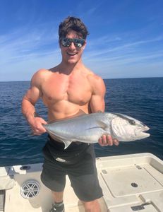 Angler with a huge greater amberjack fish in FL
