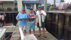 Two anglers fishing on the beach in Cape May