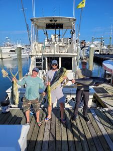 Three anglers fishing with rods in New Jersey