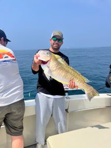 Angler with a 24-inch fish caught in Cape May