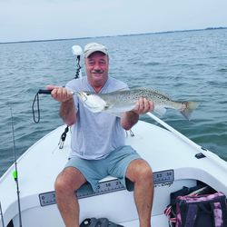 Angler with a 25-inch spotted weakfish in Palm Bay.