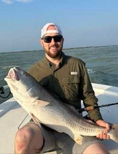 Angler with a 23-inch fish in Port Aransas