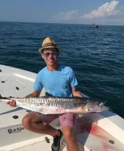 Angler with a 34-inch fish, fishing in Port Aransas