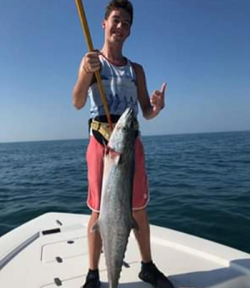 One person fishing in Port Aransas