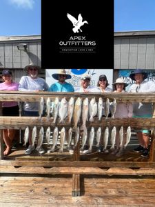 A group of 7 people fishing in Corpus Christi