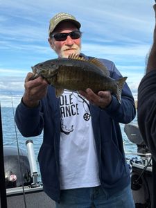 One person fishing in Sackets Harbor