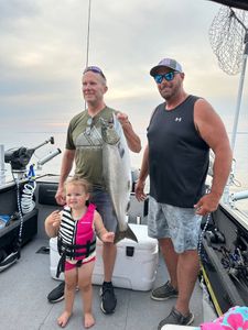Chinook salmon catch displayed on fishing boat deck in Sackets Harbor NY