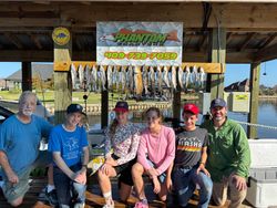 Group of 6 people fishing in TX