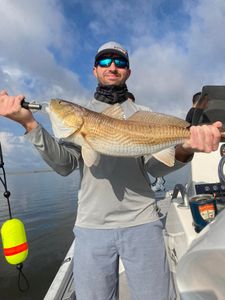 Redfish caught by two people fishing on Bridge City bridge