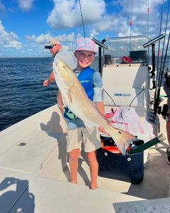 Trophy sized Redfish caught by a young Angler