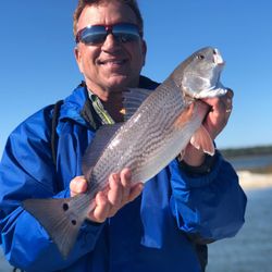 A single angler fishing in the waters of St. Marys