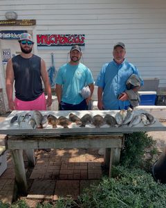 Three people enjoying a great fishing trip in GA