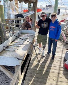 Three people fishing in St. Marys