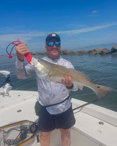 A person fishing in St. Marys