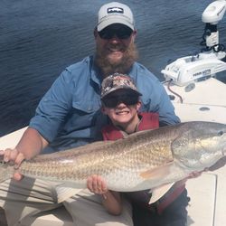 Two people fishing with big fish in GA