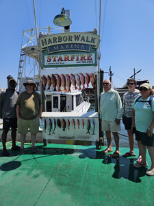 Five people enjoying fishing in Destin