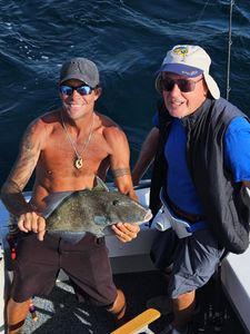 Three people fishing in Destin