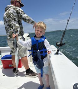 Successful fishing trip in Morehead City NC with caught fish on boat deck