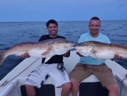 Two anglers fishing with rods in NC